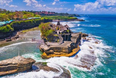 Discover Tanah Lot Temple in Bali with Atria Tourist—your top choice for stunning coastal landmarks!