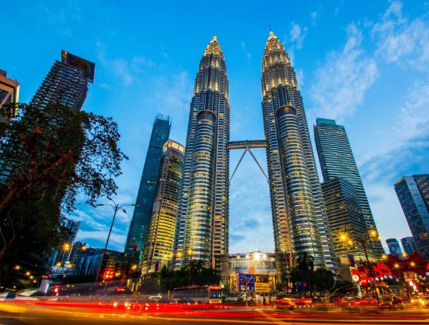 Atria Tourist showcases the Petronas Twin Towers, Kuala Lumpur's iconic skyline gem in Malaysia.